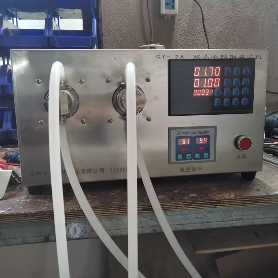 CY-2A双头不锈钢灌装机矿泉水磁力泵灌装机液体自动分灌装机