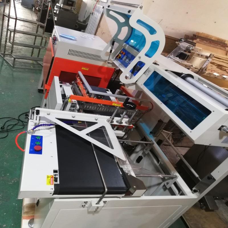 QD-100全自动热收缩包装机大型塑封机热收缩膜包装机边封机