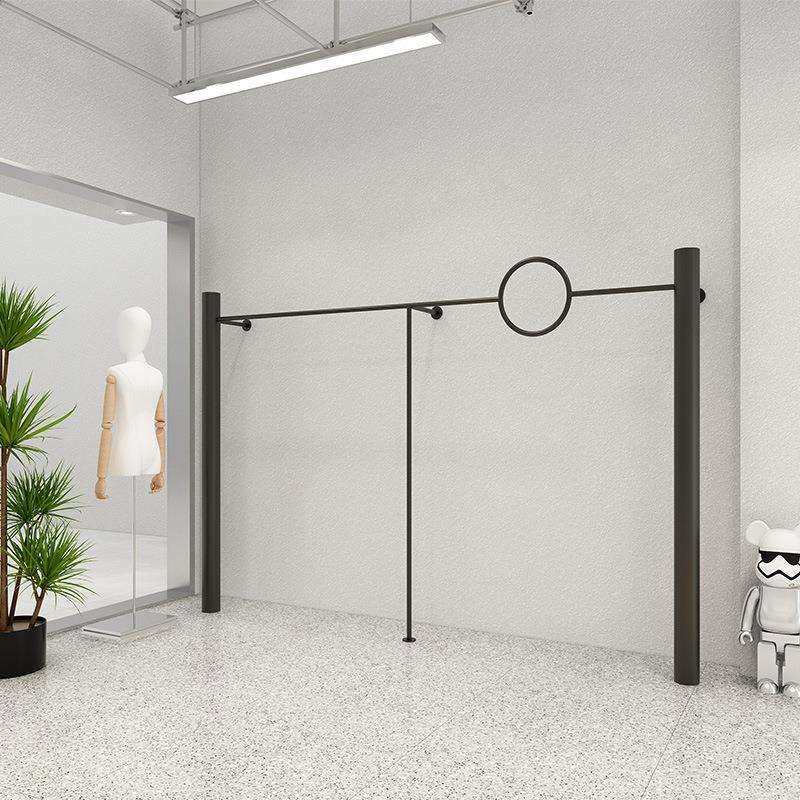 男女服装店展示架上墙哑光黑创意个性圆圈衣服壁挂陈列货架