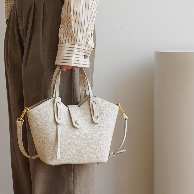 小众设计包包女2024新款简约百搭手提翅膀M包高级质感菜篮子水桶,箱包皮具/热销女包/男包,水桶包,淘宝优惠券,粉丝福利购,淘宝优惠卷