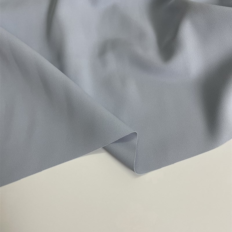 E368春夏季浅蓝色梭织混纺布头柔软细腻垂感裤子西服上衣服装面料