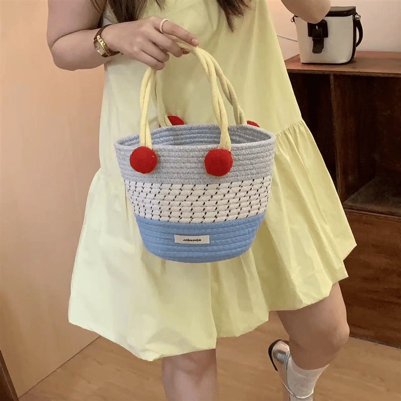 百搭海边手提编织包女甜美编织小号沙滩包休闲出游水桶包出片圆底图片