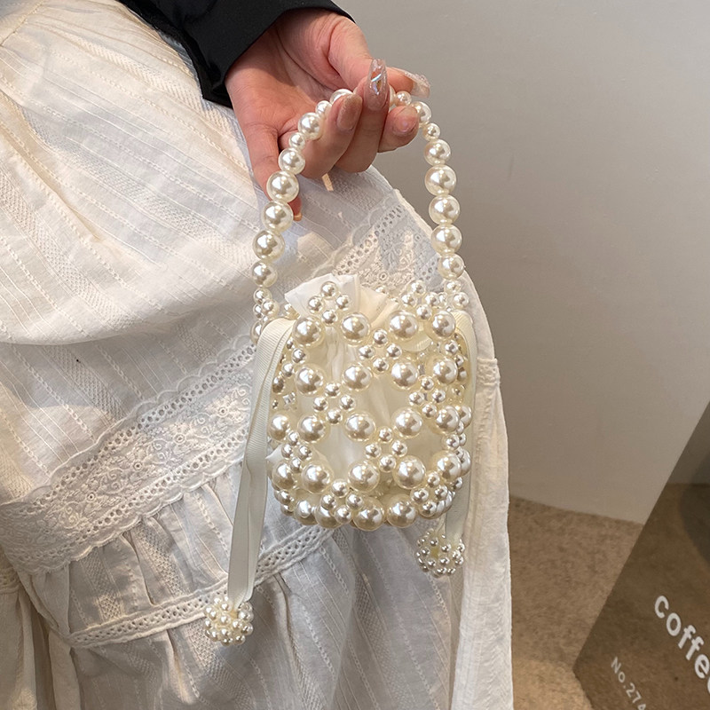 2023新款网红夏季手提珍珠包洋派时尚女童外出可爱百搭公主斜挎包