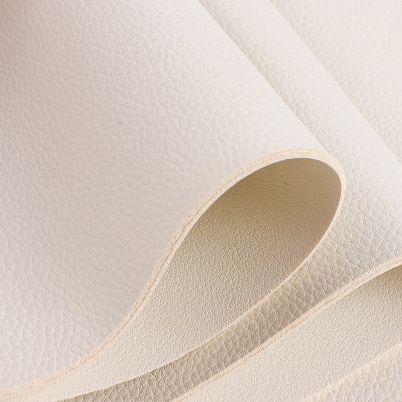 Y569同底同色1.6mm 荔枝纹双面革PVC人造革面料 适用箱包桌垫皮料