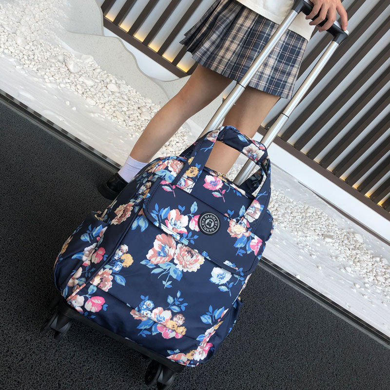 拉杆背包可提可拉可折叠拉杆x包旅行袋帆布防水印花短途行李包女