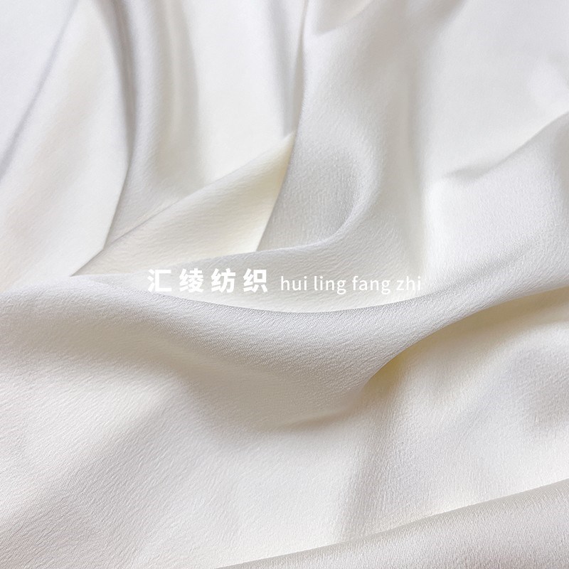 奶白色肌理纹微弹化纤麻纱缎面布料夏季垂感裙子练功夫服装面料