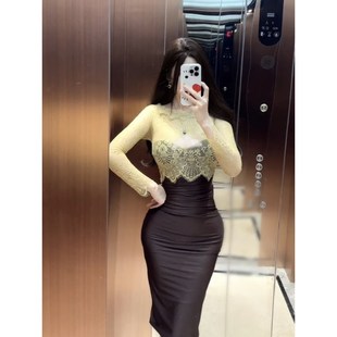 孙智慧巴伐利亚风情 裸肩一字领蕾丝拼接长袖连衣裙