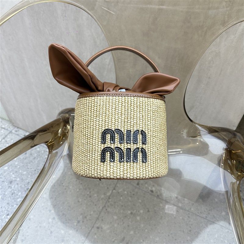 时尚蓝色草编定型手提水桶包包个性时髦小众潮流斜跨质.感小包女