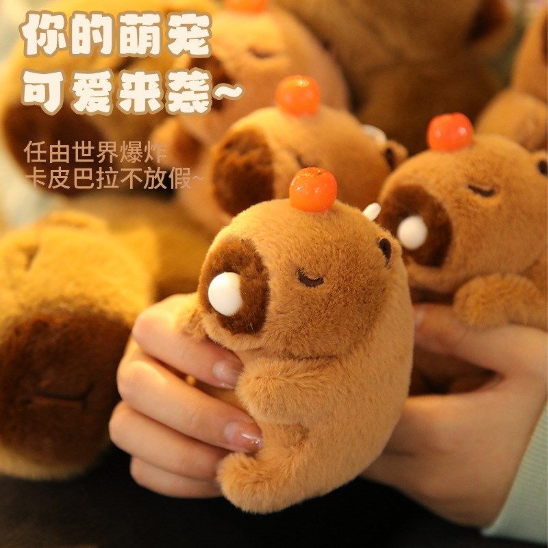 会摇尾巴的公仔吸鼻涕卡皮巴拉挂件拉绳线水豚玩偶吐泡泡毛绒玩具