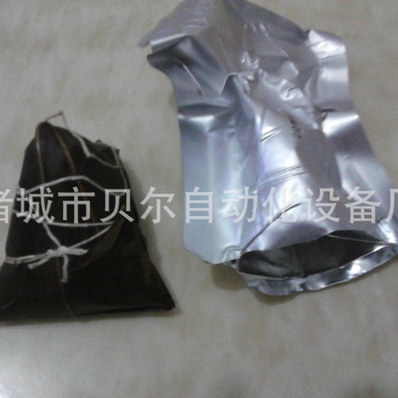 全自动铝箔袋双面拉伸真空包装机-切圆角包装-诸城贝尔包装机厂家