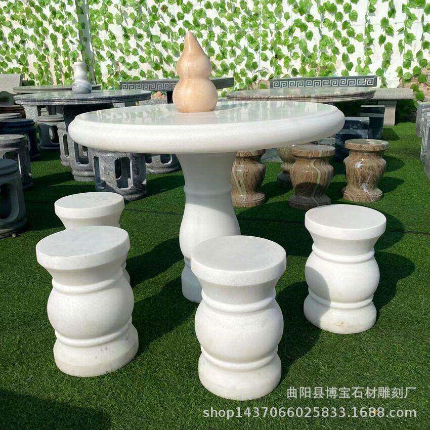 定制汉白玉石雕桌子天然无瑕疵白玉圆桌石桌四个石凳现货价格优惠