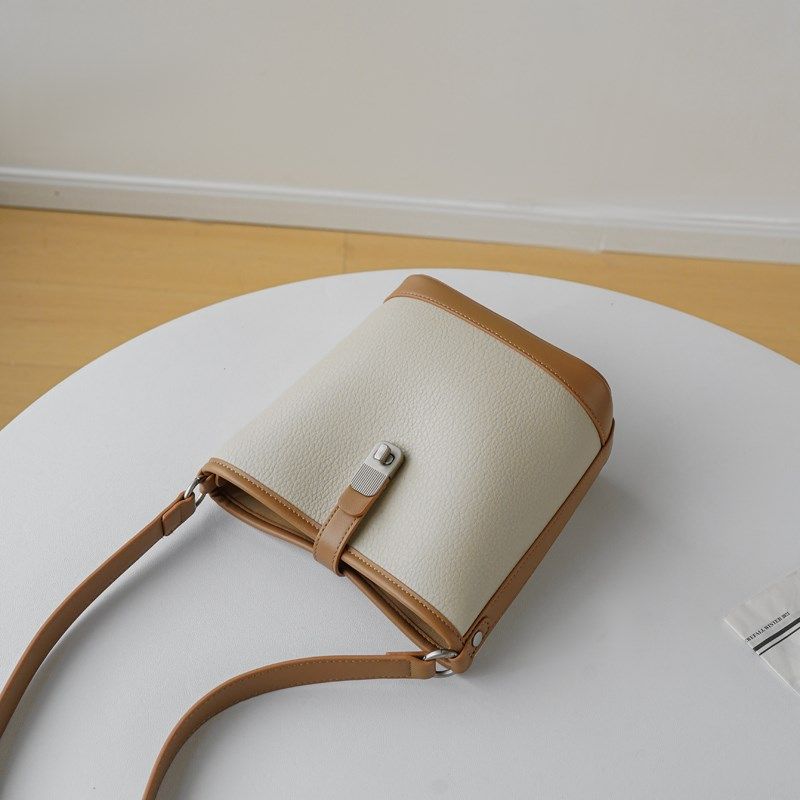 小众设计包包女2024新款高级y感精致撞色水桶包通勤百搭手提单肩,箱包皮具/热销女包/男包,水桶包,淘宝优惠券,粉丝福利购,淘宝优惠卷