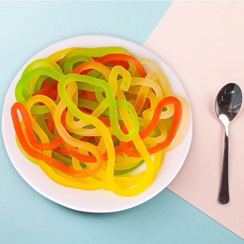 优卡五彩绳橡皮糖果汁味彩虹长条软糖儿童年怀旧小零食请避光储存