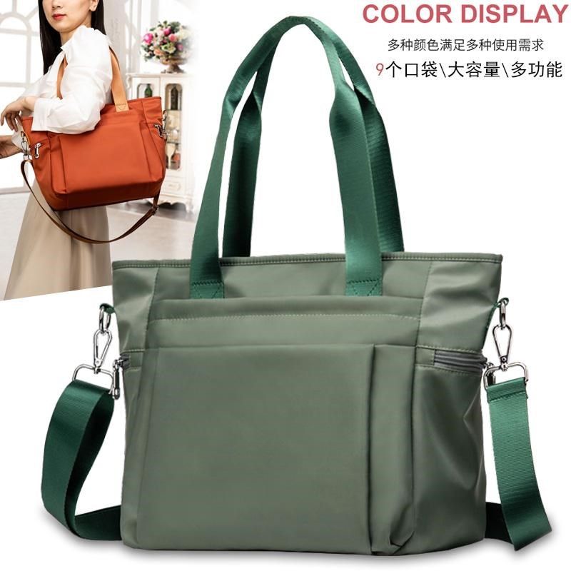 新款牛津手提旅行布包尼龙防水大A容量舞蹈瑜伽多口袋单肩斜挎女