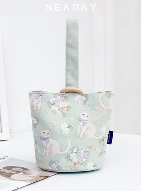 尼睿x拾雨 新款l水桶包可爱猫咪插画帆布包文艺手拎袋绿色包包女