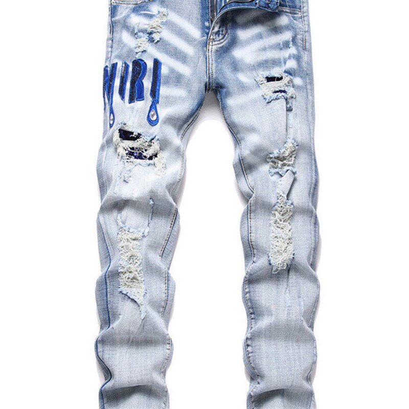 美式高街青少年轻奢修身牛仔裤男弹力小脚破洞休闲补丁高端长裤子