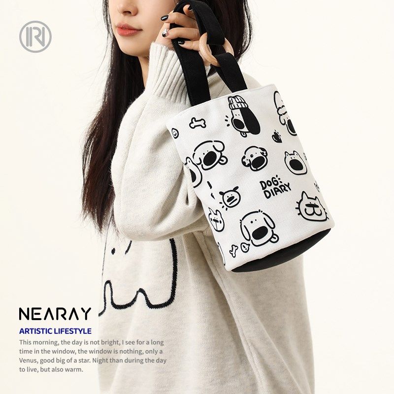 尼睿x吃盐的鱼 黑白简约水桶包可爱狗子手提P包儿童帆布包礼品布,箱包皮具/热销女包/男包,通用款女包,淘宝优惠券,粉丝福利购,淘宝优惠卷