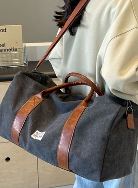 短途旅行包女2024o新款美式帆布大容量出差健身旅游男手提斜挎大