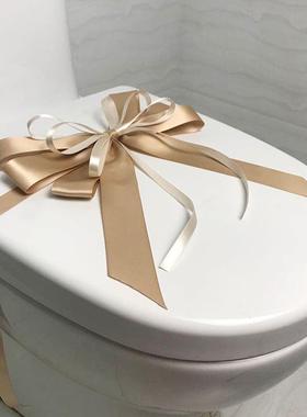 样板房间卫生间马桶装饰蝴蝶结拉花卫浴展厅新房交付绑花封条摆件