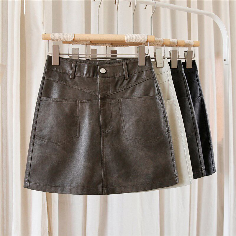 咖色皮裙半身裙女a字秋冬款2024新款黑色PU皮短裙棕色高腰包臀裙