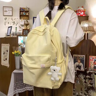 奶黄色书包女生初中生大容量双肩包日系简约纯色大学生学院风背包