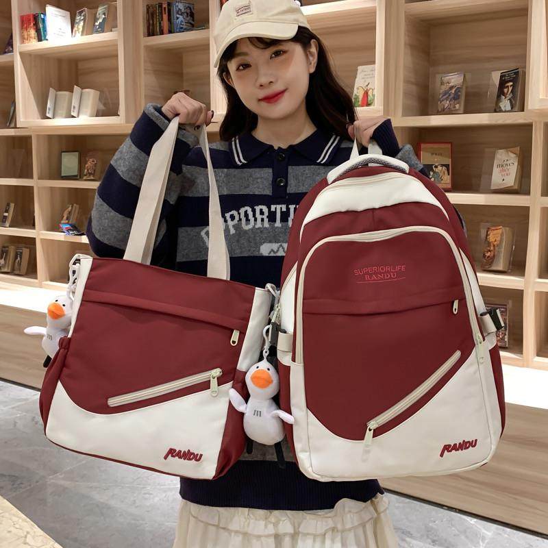 新品书包女韩版拼色百搭大容量初中生高中生双肩包男生简约大学生