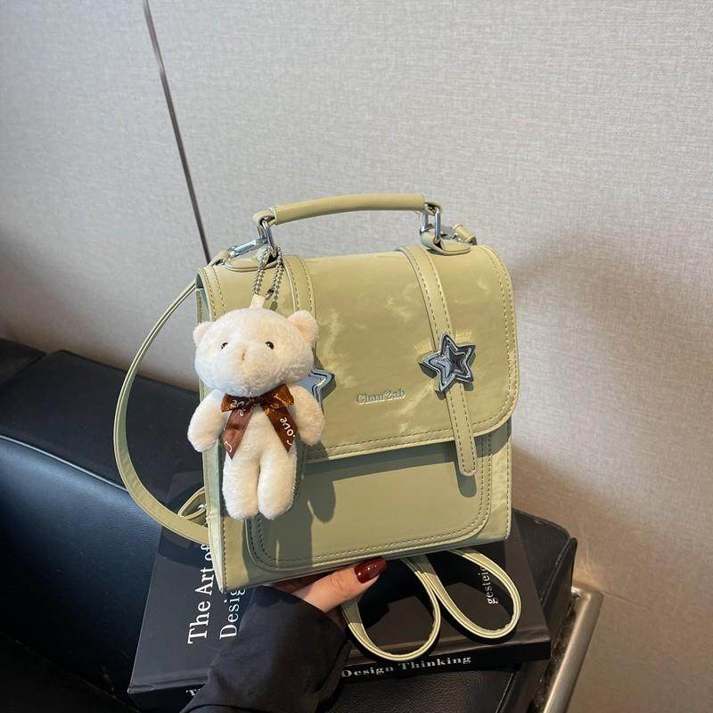 新品2025新款星星时尚学院风多功能纯色复古书包手提旅行双肩包包