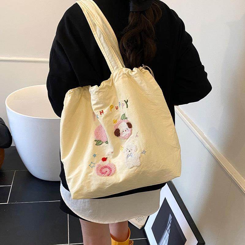 新品小清新刺绣帆布包女2025新款日系卡通单肩通勤包大容量休闲托,箱包皮具/热销女包/男包,时尚帆布包,淘宝优惠券,粉丝福利购,淘宝优惠卷