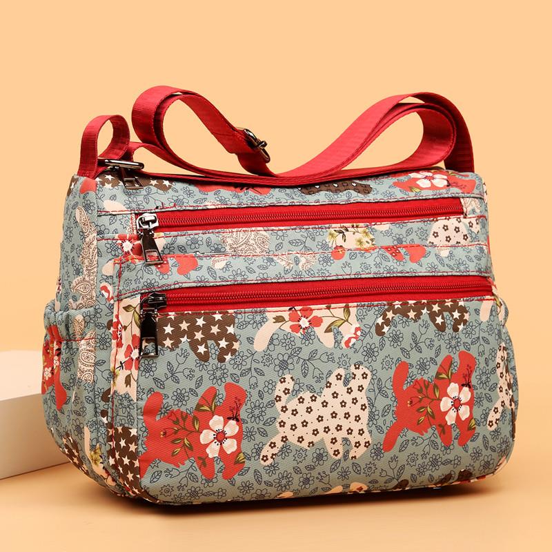 新品中年女士布包斜挎包妈妈包简约帆布单肩包百搭牛津纺中老年人