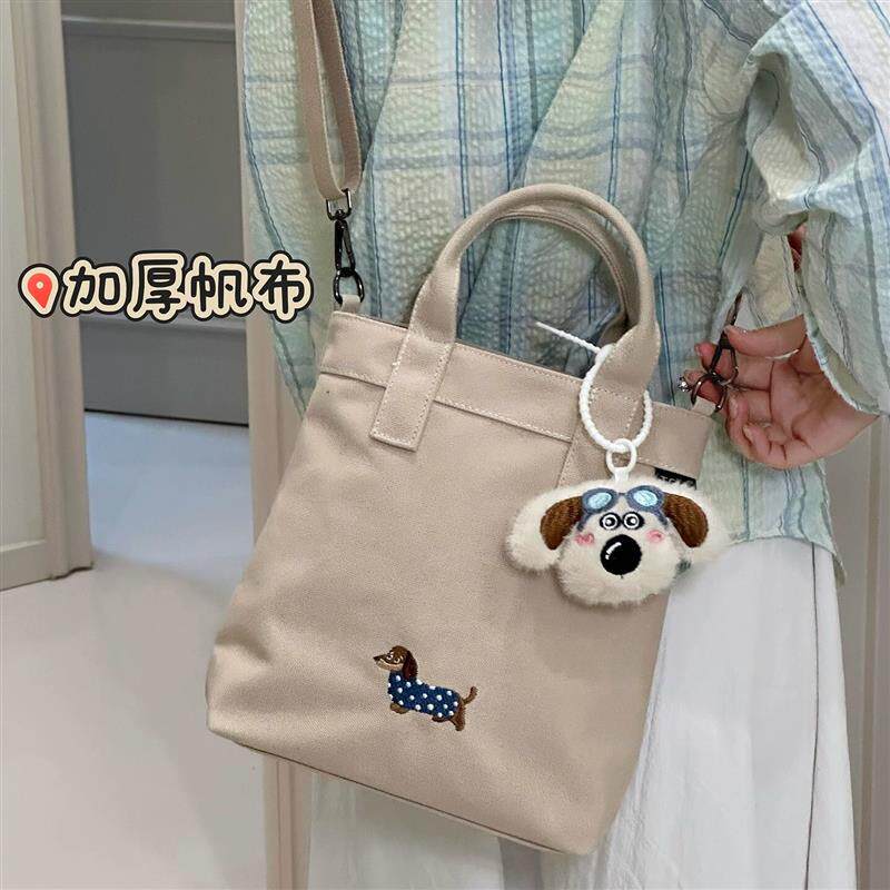 新品简约休闲帆布包包女日常通勤斜挎包初中女生高中学生手提袋单