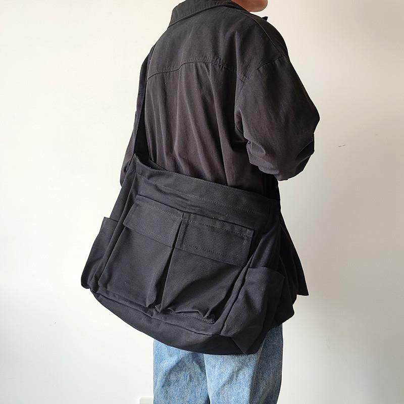 新品帆布包男大容量学生书包工装休闲斜挎包时尚多兜单肩包女背包