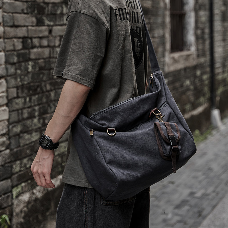 新款斜挎包男时尚简约便携水洗帆布包潮流百搭轻便单肩包通勤男包