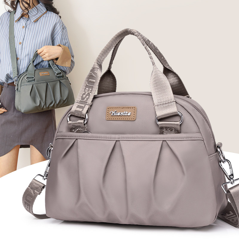 手提包女妈妈2024新款大容量多A层轻便斜挎牛津布帆布包上班小拎