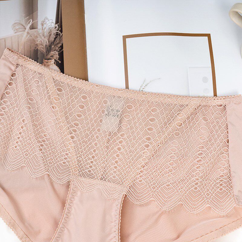 D35重璞内裤女舒适透气三角裤中腰提臀打底裤戴珍珠耳环的少女