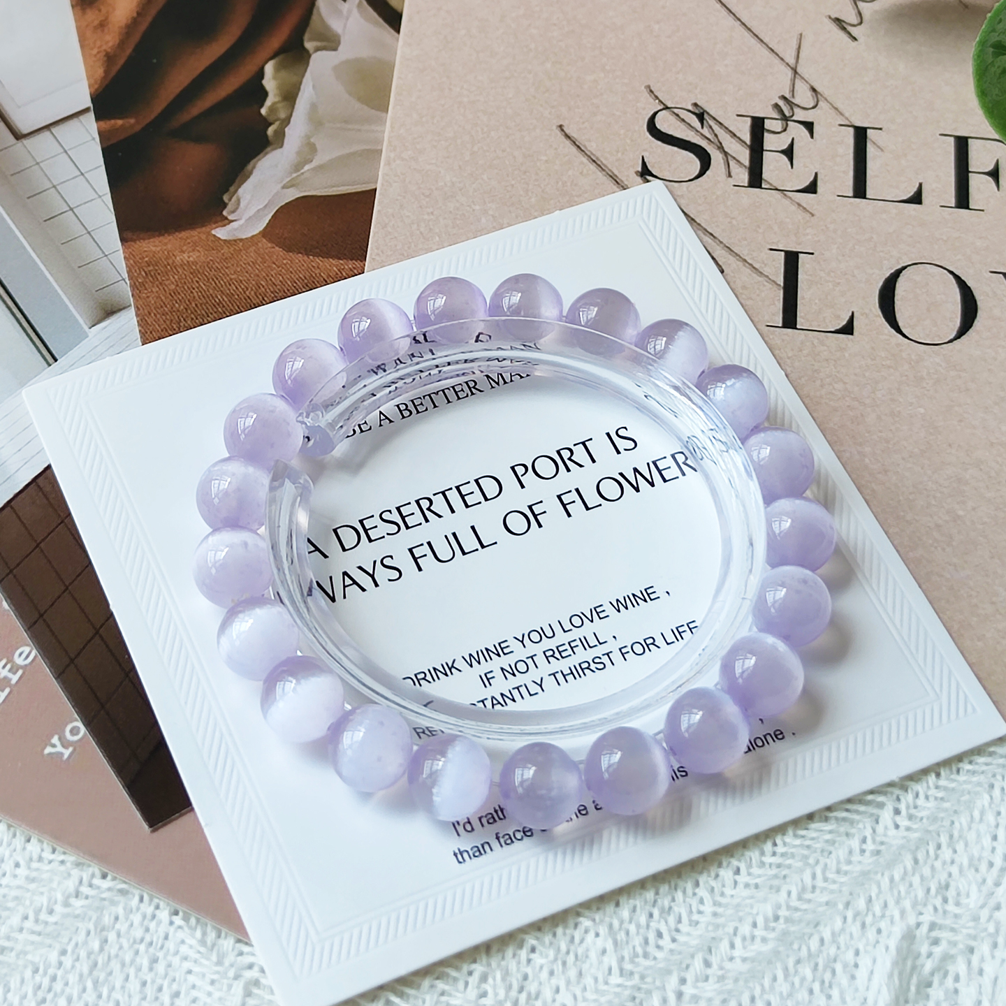 祈灵晶天然透石膏紫猫眼石手串女