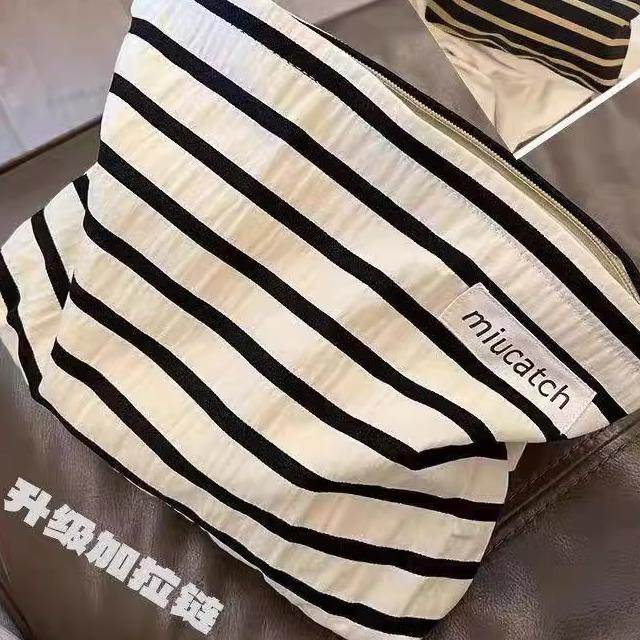 日式小众设计碎花化妆包气质提花帆布包文艺复古素雅手拿包便携包