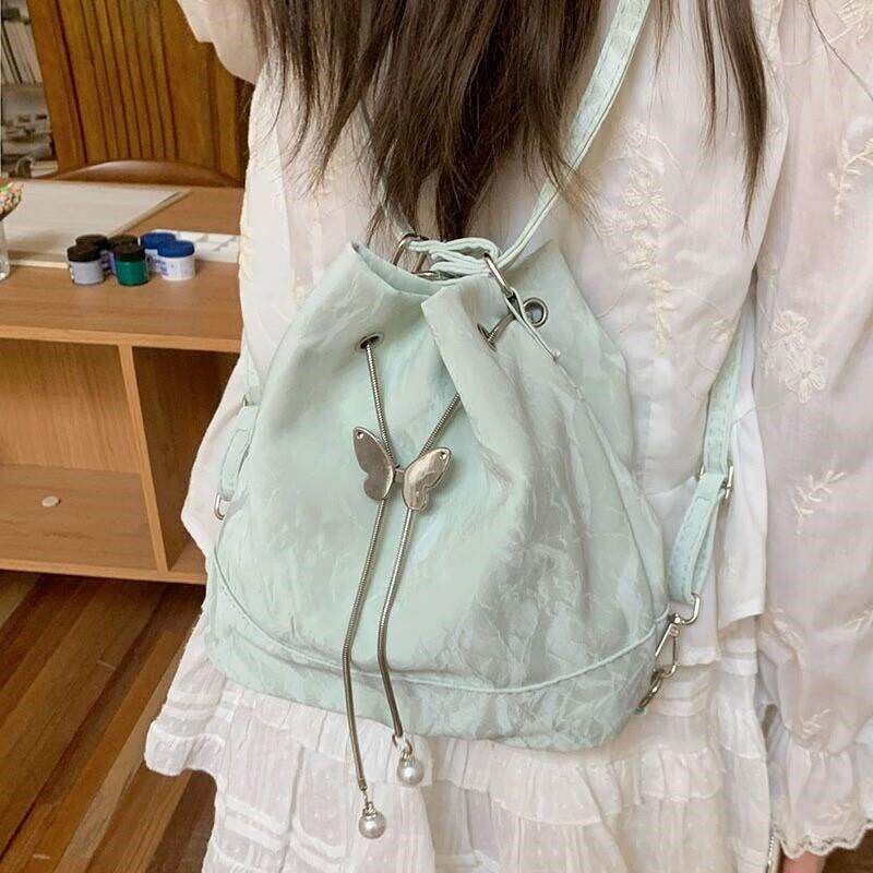 薄荷曼波绿双肩背包包女2024新款潮韩国水桶包百搭ins单肩腋下包