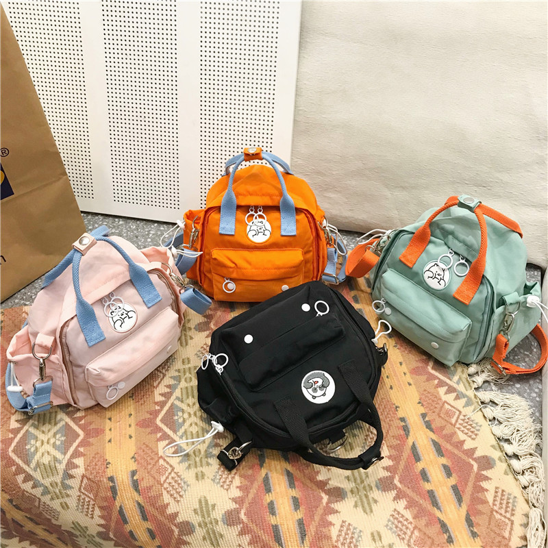 上新小包包双肩包女小清新少女软妹帆布斜跨背包百搭迷你书包