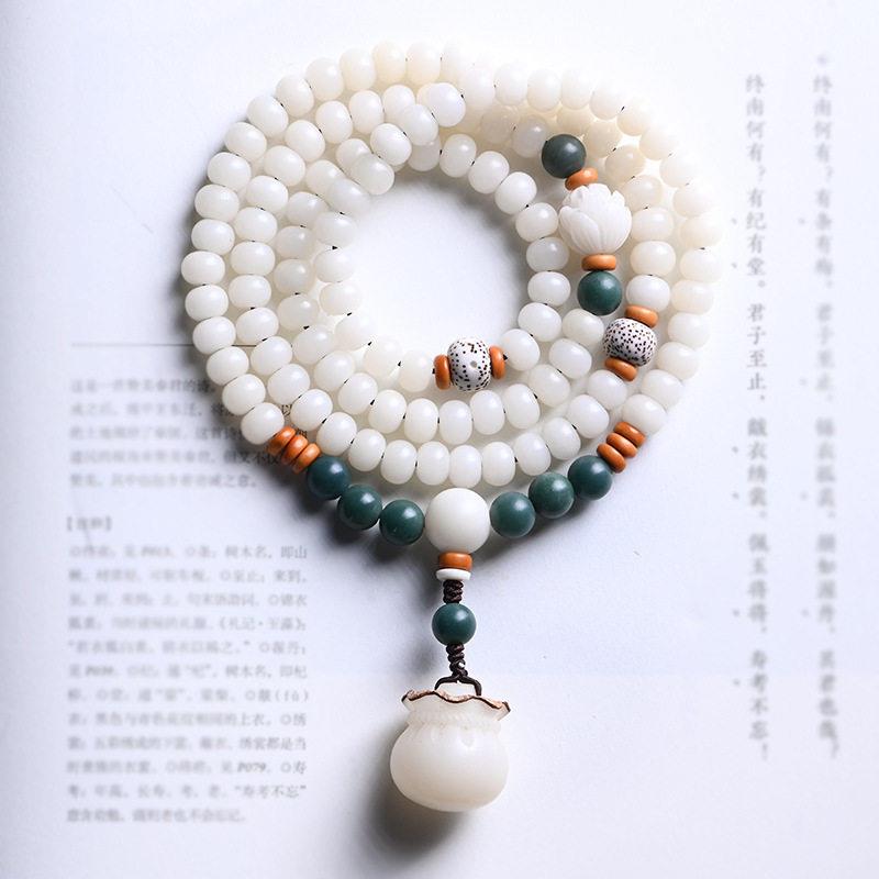 菩提根手串白玉菩提子108颗佛珠手持念经雕福财袋项链桶珠念珠