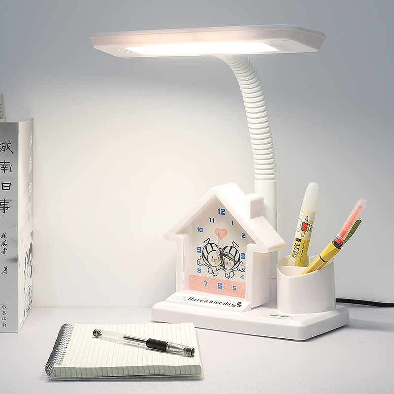 儿童护眼台灯小学生书桌插电式学习专用卡通闹钟卧室床头书房包邮