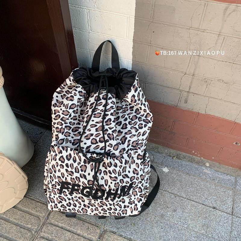 推荐抽绳束口户外风运动双肩包女豹纹少女滑板包羽毛球拍包小众个