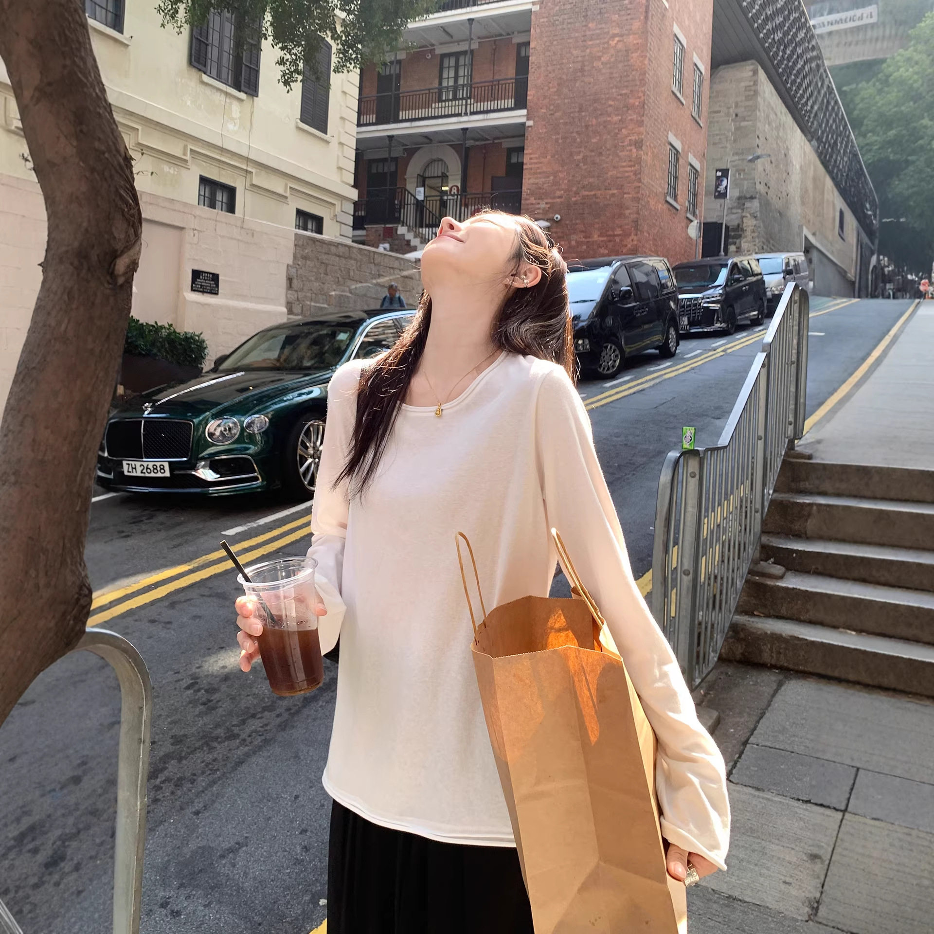 百视旺 雪花肌理感白色长袖T恤女早春新款宽松百搭显瘦休闲上衣