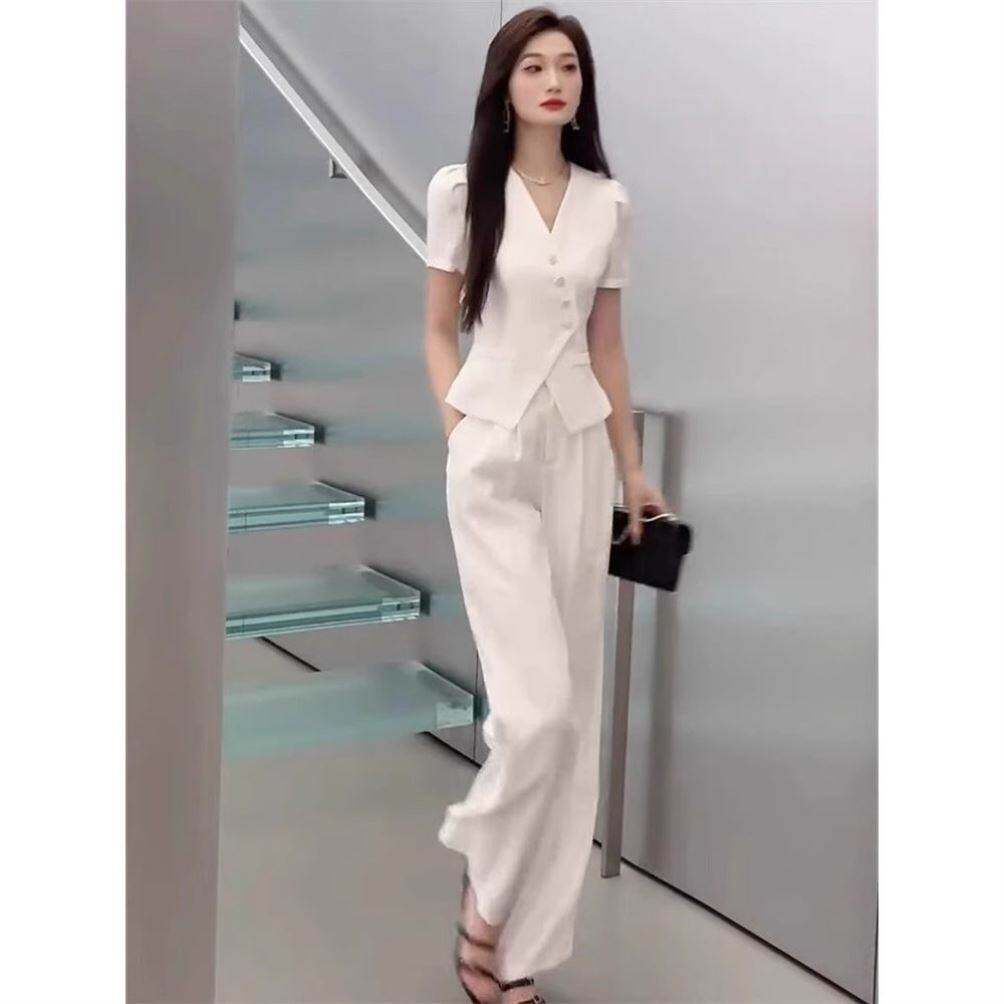 超好看时尚套装女2026夏季职业高级斜纽扣西服上衣修身长裤两件套