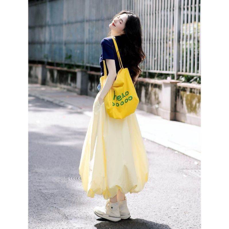 黄色花苞半身裙女2026夏季款灯笼裙遮胯显瘦高腰字云朵蓬蓬裙子