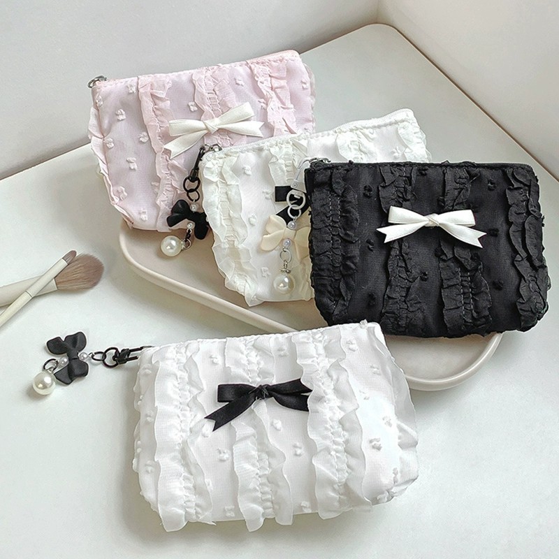 可爱化妆包化妆袋新款韩版蕾丝蝴蝶结大容量零钱包手拿包女收纳包