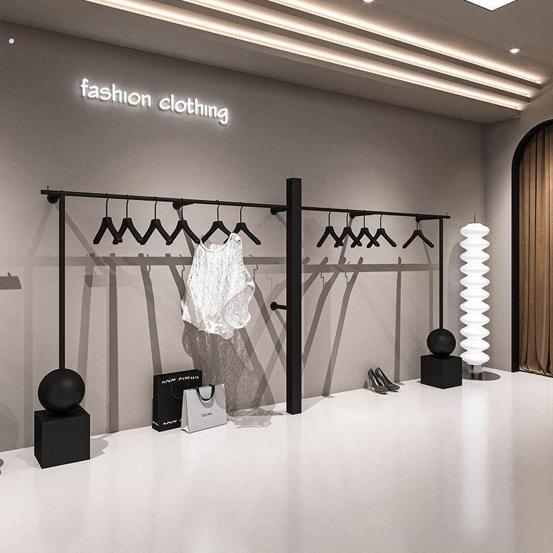 服装店展示架上墙专用铁艺简约黑色挂衣架女装店墙上衣服陈列货架图片