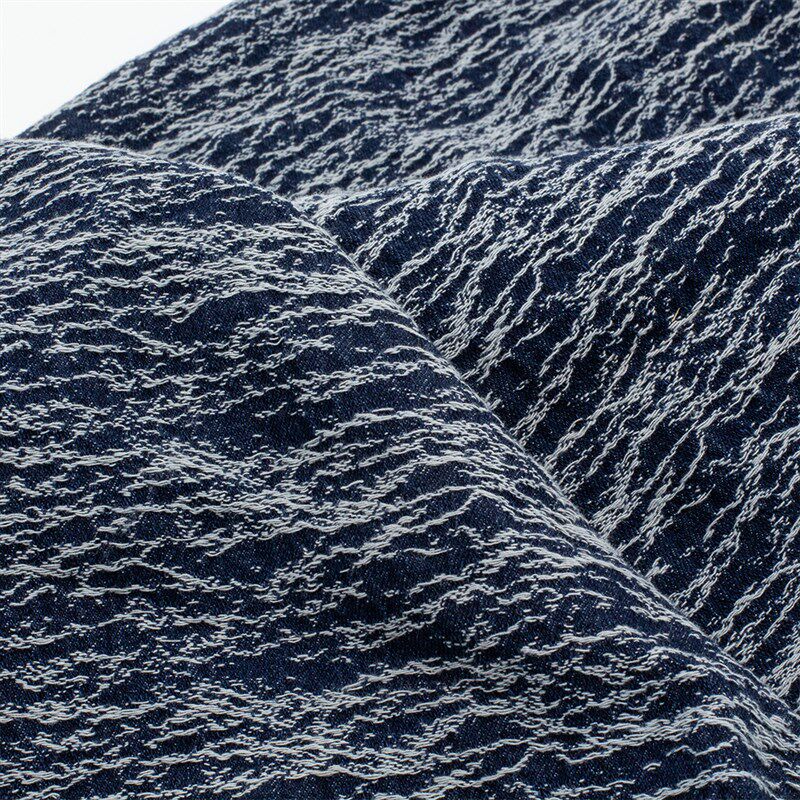 深蓝色雪花线条纹提花牛仔布料水洗厚款高档肌理外设计师面料