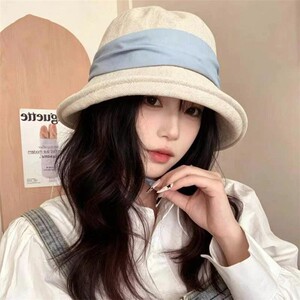 奈亚轻奢服饰2夏季新撞色后开叉蝴蝶结渔夫帽户外防晒显脸小遮阳
