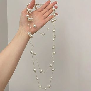 高级感奶白色仿珍珠项链秋冬新款轻奢叠戴长款设计毛衣链多层串珠