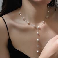 A high-end cream-colored pearl-like necklace for autumn and winter, featuring a light luxury layer-and-wear long design and a multi-layered beaded sweater chain thumbnail 2